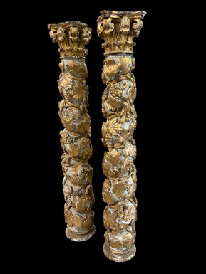Pair of 17th-century Baroque twisted columns Highly decorative columns adorned with vines, birds and Corinthian capitals covered with antique gilding and polychrome decoration Columns in good condition with wear to the wood, gilding and polychrome.
