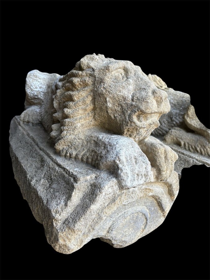 Pair of 17th century French stone ‘reclining lions’ sculptures Upper parts of an entrance gate to a country house or chateau.Very decorative sculptures in good condition, 17th c