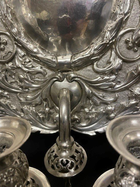 Pair of 19th century silver-plated sconces / candleholders. Decorative Renaissance style sconces with 2 candles. 1 of the sconces is much lighter and possibly silver. Dimensions: Height : 54 cm Width : 34 cm Depth : 14 cm In good condition