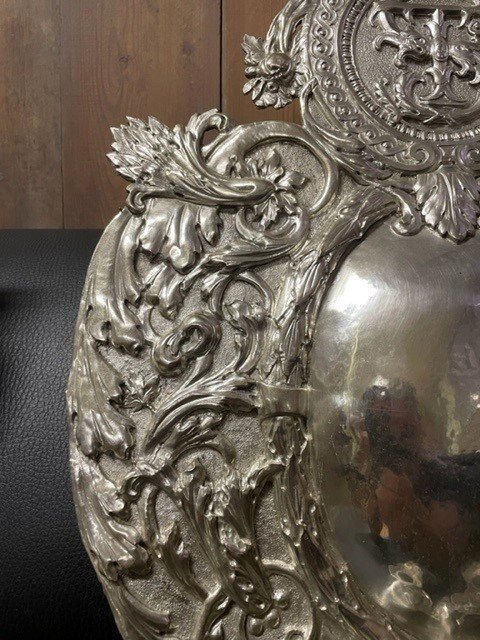 Pair of 19th century silver-plated sconces / candleholders. Decorative Renaissance style sconces with 2 candles. 1 of the sconces is much lighter and possibly silver. Dimensions: Height : 54 cm Width : 34 cm Depth : 14 cm In good condition