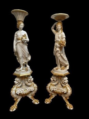 Pair of beautiful 19thC. wooden pedestal sculptures. Very decorative female figures, finely carved in white with golden accents, resting on magnificent pedestals.