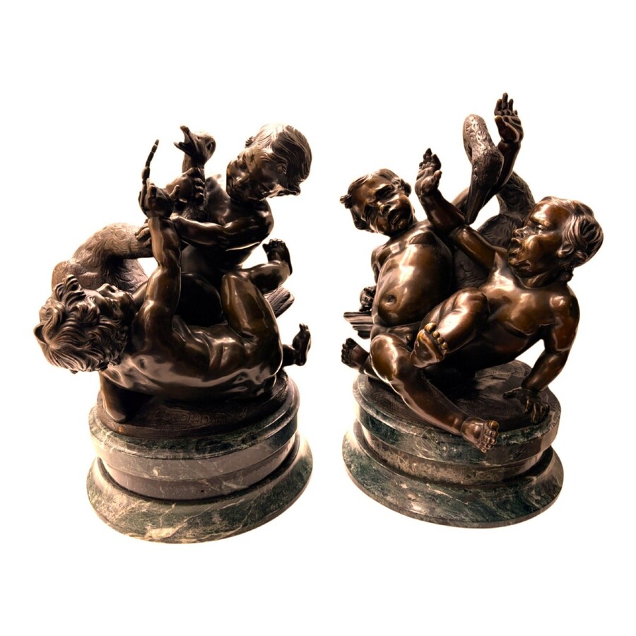 Pair of bronze sculptures ‘putti with swan’ after Clodion, 19th century Attractive pair of decorative bronze sculptures mounted on a marble base. Both sculptures are signed Clodion / Cresson éditeur.