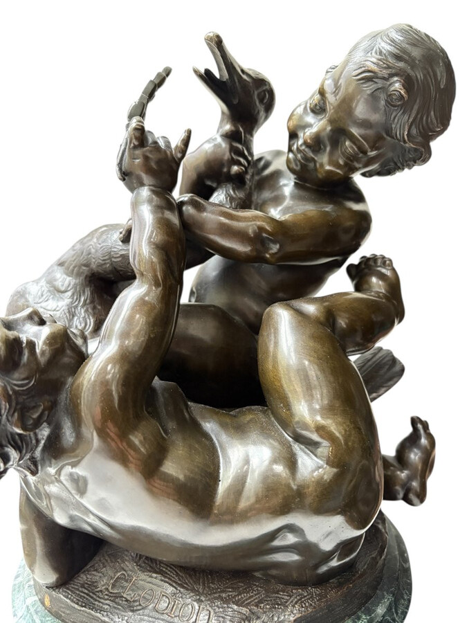 Pair of bronze sculptures ‘putti with swan’ after Clodion, 19th century Attractive pair of decorative bronze sculptures mounted on a marble base. Both sculptures are signed Clodion / Cresson éditeur.