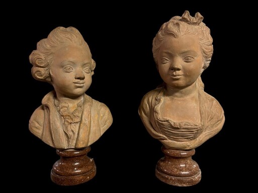 Pair of charming busts in terra cotta 18th century. Busts depicting a girl and a boy , signed and dated at the back 1775 Marble base of later date Dimensions : Height : 35.5 cm ( girl ) , 34 cm ( boy ) Width : 18 cm Dia foot : 10 cm