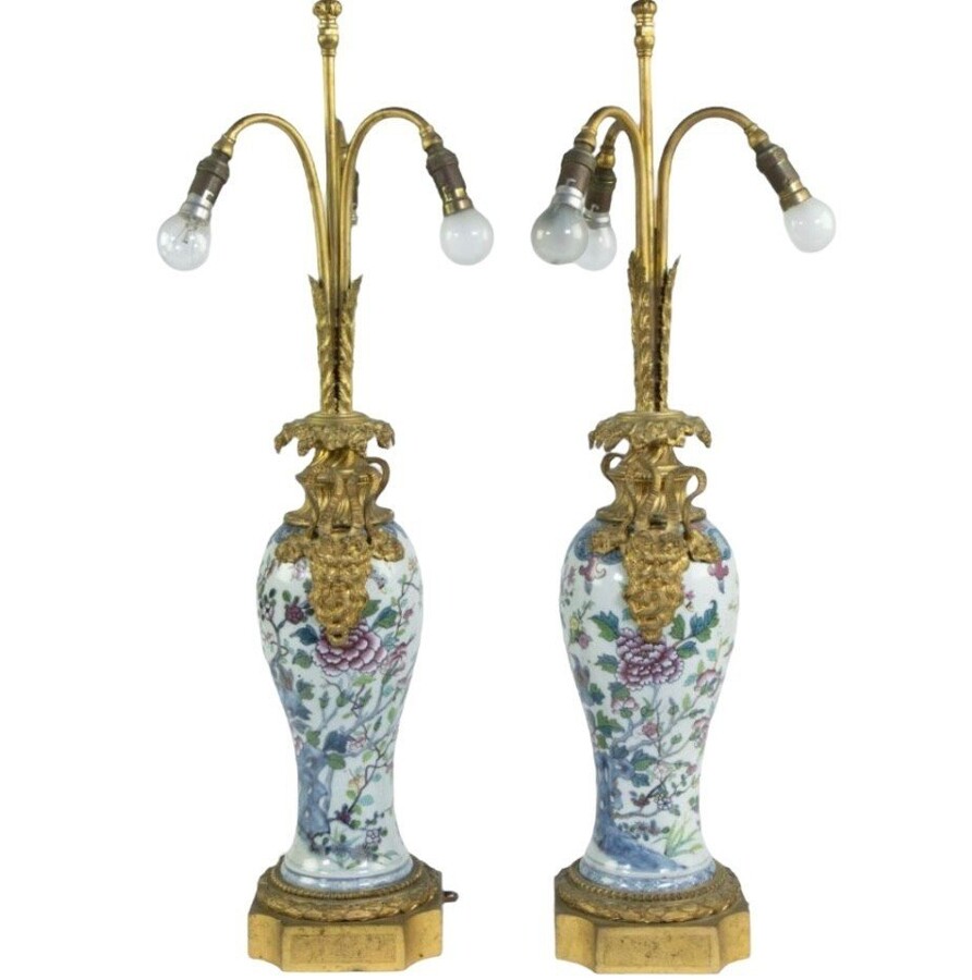 Pair of Chinese famille rose vases transformed into lampadaires 19ème. Nice lamps with gilt bronze mounts , 19thCentury Dimensions : Height : 78 cm base : 16 x 16 cm In very good condition, 19thC.