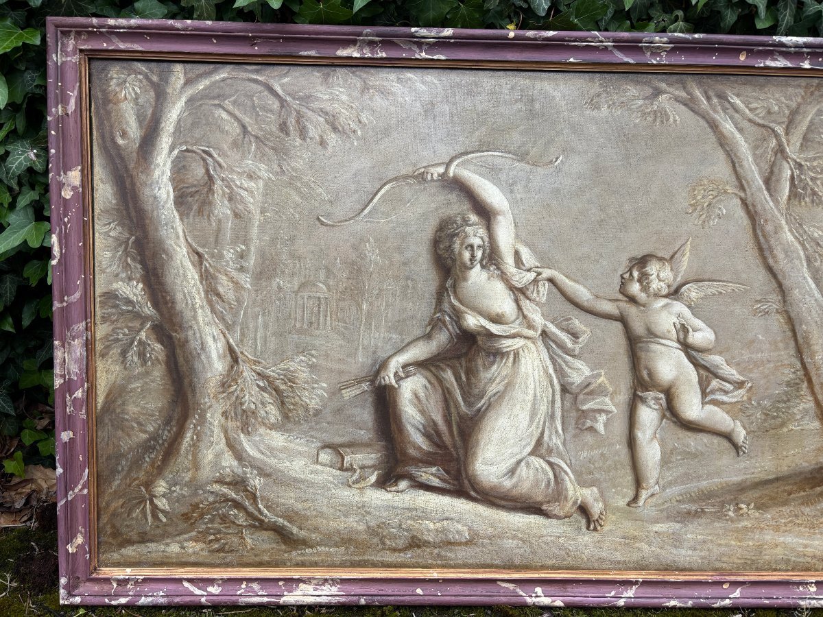 Pair of Grisailles landscape scene oil on canvas late 18th century. Very beautiful grisailles in a faux marble wooden frame depicting an angel with a lady in a landscape with a waterfall, trees and buildings in the background.