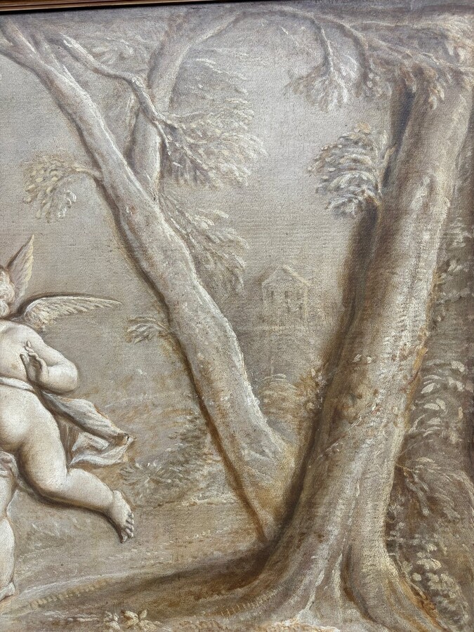 Pair of Grisailles landscape scene oil on canvas late 18th century. Very beautiful grisailles in a faux marble wooden frame depicting an angel with a lady in a landscape with a waterfall, trees and buildings in the background.