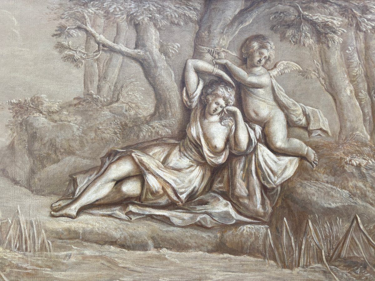 Pair of Grisailles landscape scene oil on canvas late 18th century. Very beautiful grisailles in a faux marble wooden frame depicting an angel with a lady in a landscape with a waterfall, trees and buildings in the background.