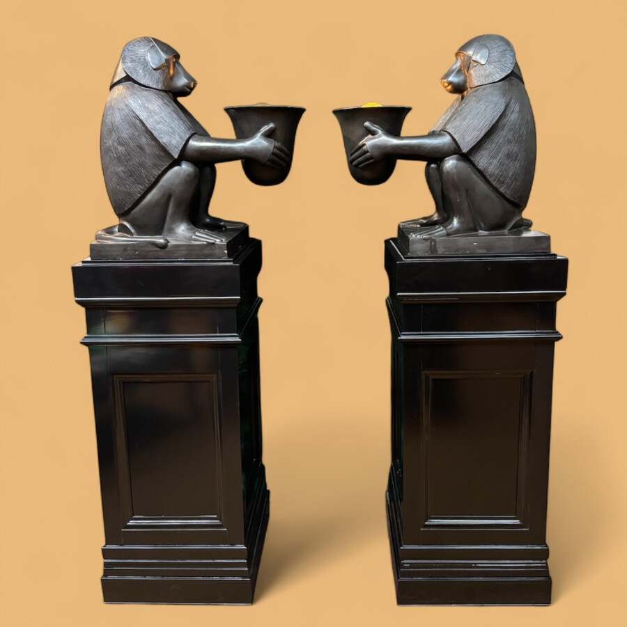 Pair of large ‘Baboons’ bronze lamps in the Art Deco style A highly decorative bronze sculpture/lamp in Art Deco style, depicting a large, finely detailed bronze baboon holding a vase containing a lamp. 