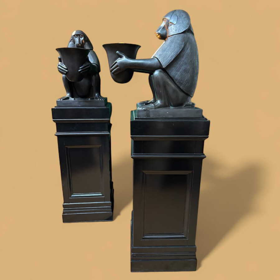 Pair of large ‘Baboons’ bronze lamps in the Art Deco style A highly decorative bronze sculpture/lamp in Art Deco style, depicting a large, finely detailed bronze baboon holding a vase containing a lamp. 