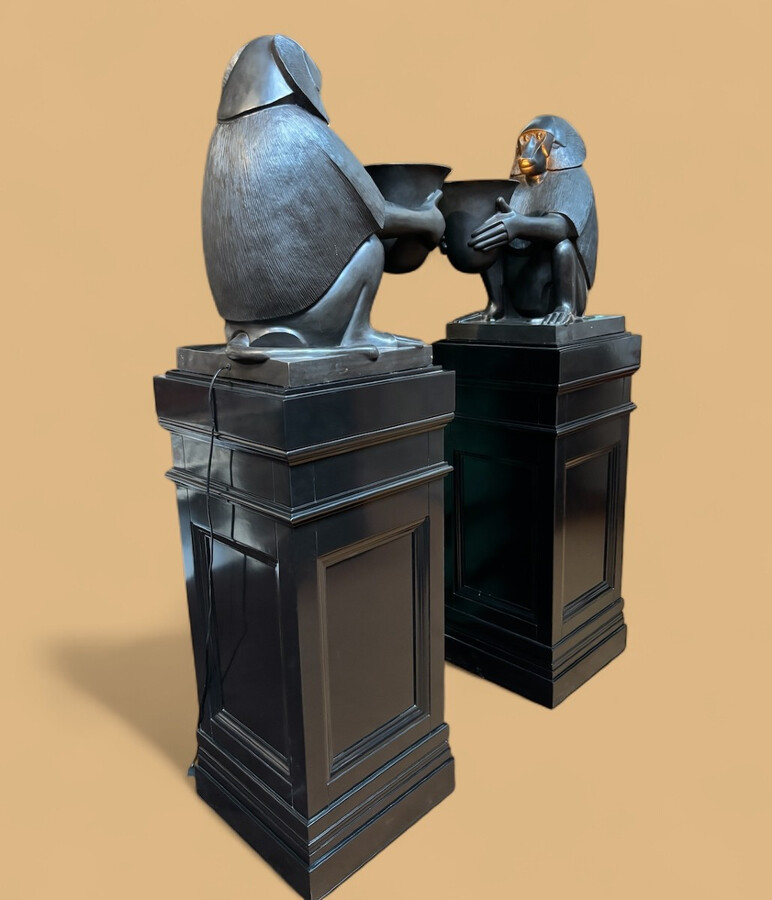 Pair of large ‘Baboons’ bronze lamps in the Art Deco style A highly decorative bronze sculpture/lamp in Art Deco style, depicting a large, finely detailed bronze baboon holding a vase containing a lamp. 