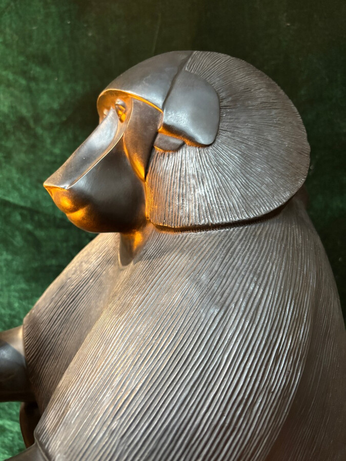 Pair of large ‘Baboons’ bronze lamps in the Art Deco style A highly decorative bronze sculpture/lamp in Art Deco style, depicting a large, finely detailed bronze baboon holding a vase containing a lamp. 