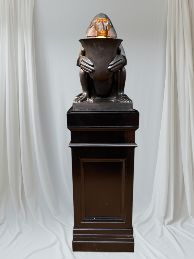 Pair of large ‘Baboons’ bronze lamps in the Art Deco style A highly decorative bronze sculpture/lamp in Art Deco style, depicting a large, finely detailed bronze baboon holding a vase containing a lamp. 