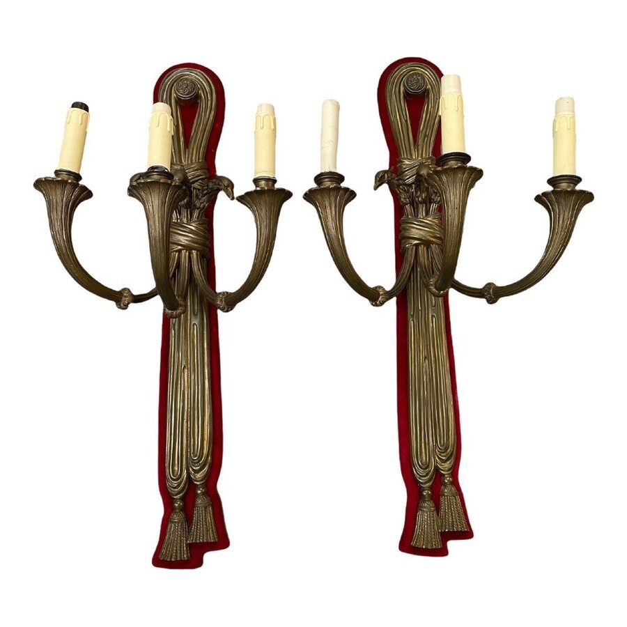 Pair Of Large Bronze Appliques Empire Style 19th Century. Very Large Appliques Decorated With 3 Eagle Heads, Mounted On A Red Velvet/Wooden Back And Provided With 3 Light Fittings. Dimensions : Height : 83 Cm Width : 39 Cm Depth : 30 Cm
