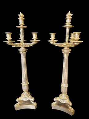 Pair of large bronze candelabra (71 cm) in Empire style, 19th century Large decorative candelabra with 4 candle holders Both in very good condition, gilding not original. Dimensions: Height: 71 cm French manufacture, 19th century.