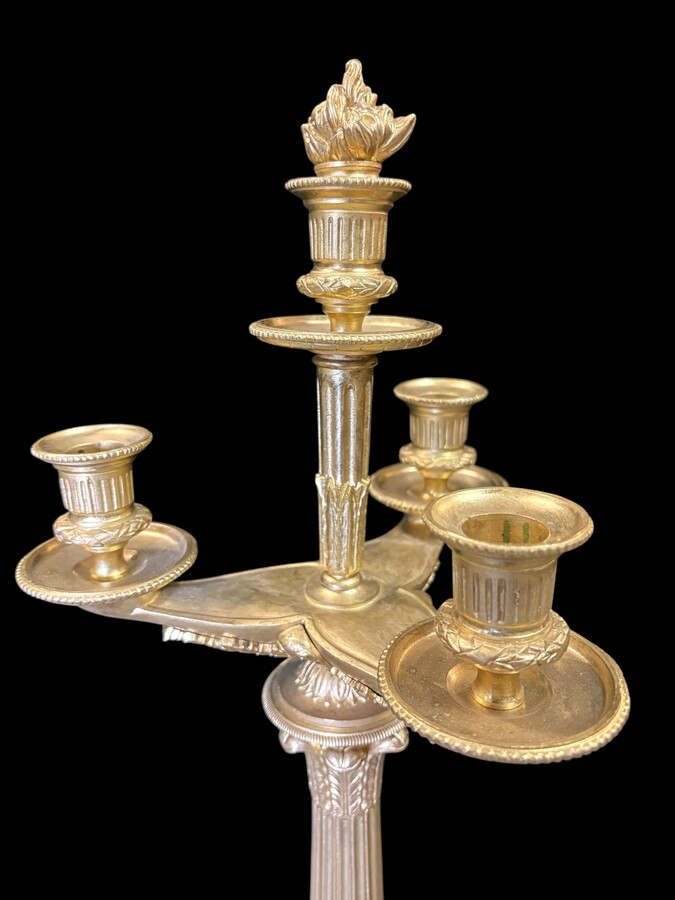 Pair of large bronze candelabra (71 cm) in Empire style, 19th century Large decorative candelabra with 4 candle holders Both in very good condition, gilding not original. Dimensions: Height: 71 cm French manufacture, 19th century.