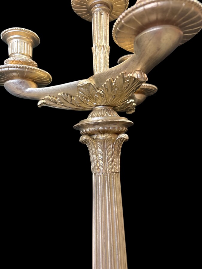 Pair of large bronze candelabra (71 cm) in Empire style, 19th century Large decorative candelabra with 4 candle holders Both in very good condition, gilding not original. Dimensions: Height: 71 cm French manufacture, 19th century.