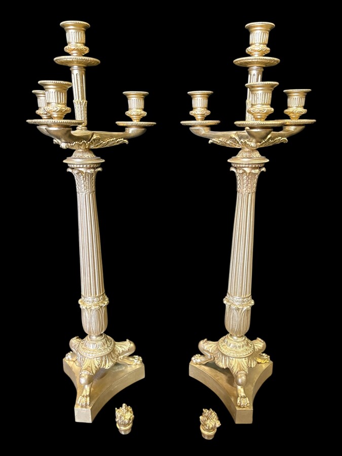 Pair of large bronze candelabra (71 cm) in Empire style, 19th century Large decorative candelabra with 4 candle holders Both in very good condition, gilding not original. Dimensions: Height: 71 cm French manufacture, 19th century.