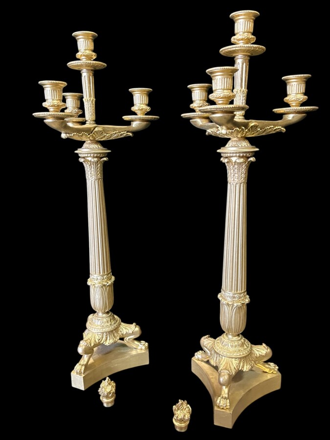 Pair of large bronze candelabra (71 cm) in Empire style, 19th century Large decorative candelabra with 4 candle holders Both in very good condition, gilding not original. Dimensions: Height: 71 cm French manufacture, 19th century.