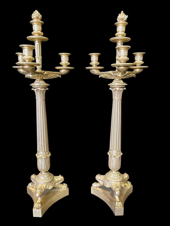 Pair of large bronze candelabra (71 cm) in Empire style, 19th century Large decorative candelabra with 4 candle holders Both in very good condition, gilding not original. Dimensions: Height: 71 cm French manufacture, 19th century.