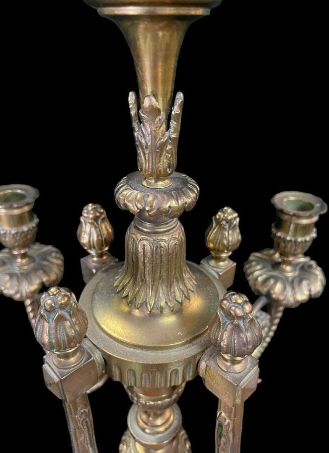 Pair of large candelabras with angels in 19th century bronze. Large Louis XVI style candelabra with 4 candlesticks. Dimensions: Height : 76 cm Width : 30 cm Depth : 32 cm Base: 16.5 x 16.5 cm Pair of large candelabras with angels in 19th century bronze.