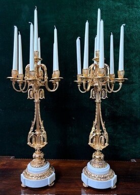 Pair of large gilt bronze candlesticks Napoleon III Very elegant candlesticks with 7 candleholders , decorated with ornaments and resting on a gilt bronze / white marble base Dimensions : Height : 74 cm Width : 31 cm Both are in good condition
