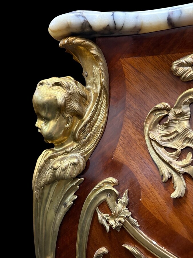 Pair of large Louis XV style marquetry/bronze columns, 20th century. High-quality columns adorned with fine marquetry and decorated with angels, ornaments and bronze feet, topped with magnificent marble. The columns are decorated all around.