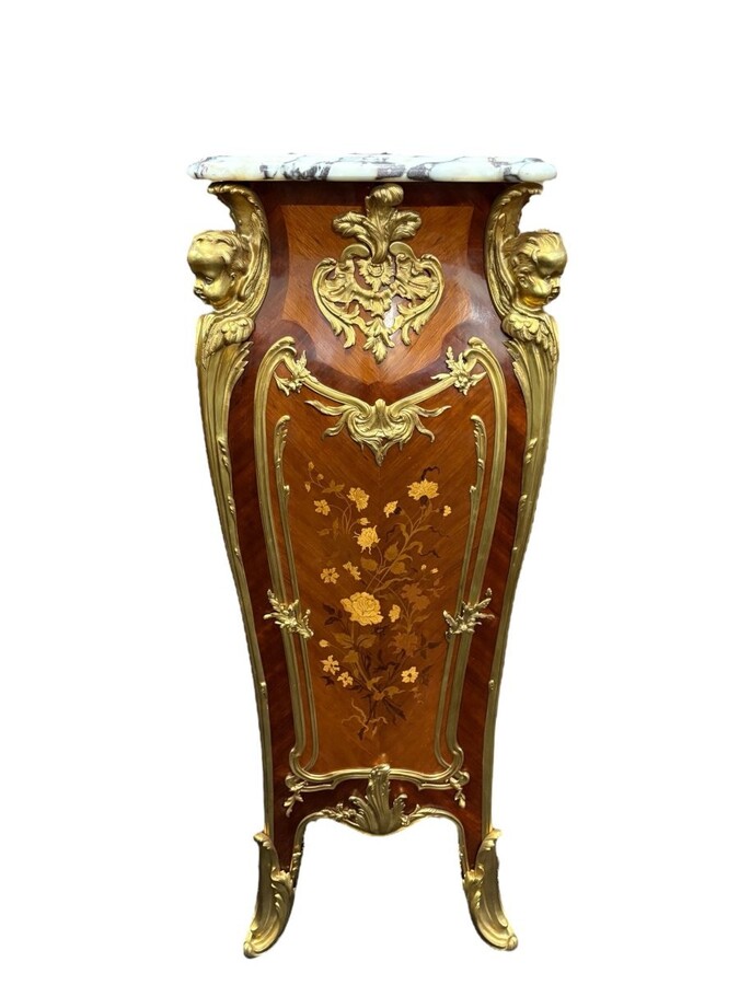 Pair of large Louis XV style marquetry/bronze columns, 20th century. High-quality columns adorned with fine marquetry and decorated with angels, ornaments and bronze feet, topped with magnificent marble. The columns are decorated all around.