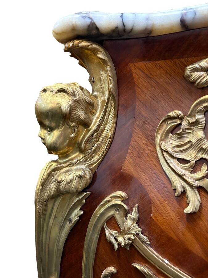 Pair of large Louis XV style marquetry/bronze columns, 20th century. High-quality columns adorned with fine marquetry and decorated with angels, ornaments and bronze feet, topped with magnificent marble. The columns are decorated all around.