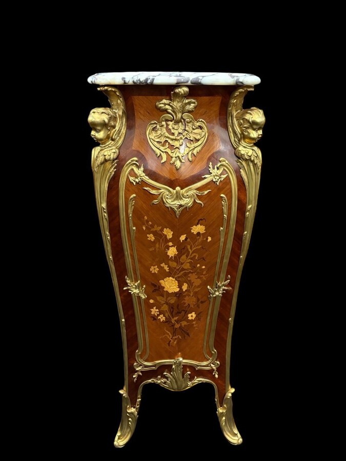 Pair of large Louis XV style marquetry/bronze columns, 20th century. High-quality columns adorned with fine marquetry and decorated with angels, ornaments and bronze feet, topped with magnificent marble. The columns are decorated all around.