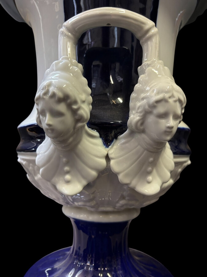 Pair of large Medici porcelain vases (45 cm) Decorative Medici vases in blue/white coloured porcelain from the middle of the 20th century with the following dimensions: Height: 45 cm Top diameter: 33 cm Diameter of foot: 22 cm Both in good condition.