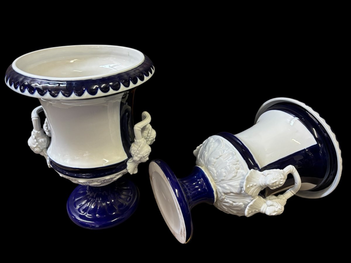 Pair of large Medici porcelain vases (45 cm) Decorative Medici vases in blue/white coloured porcelain from the middle of the 20th century with the following dimensions: Height: 45 cm Top diameter: 33 cm Diameter of foot: 22 cm Both in good condition.