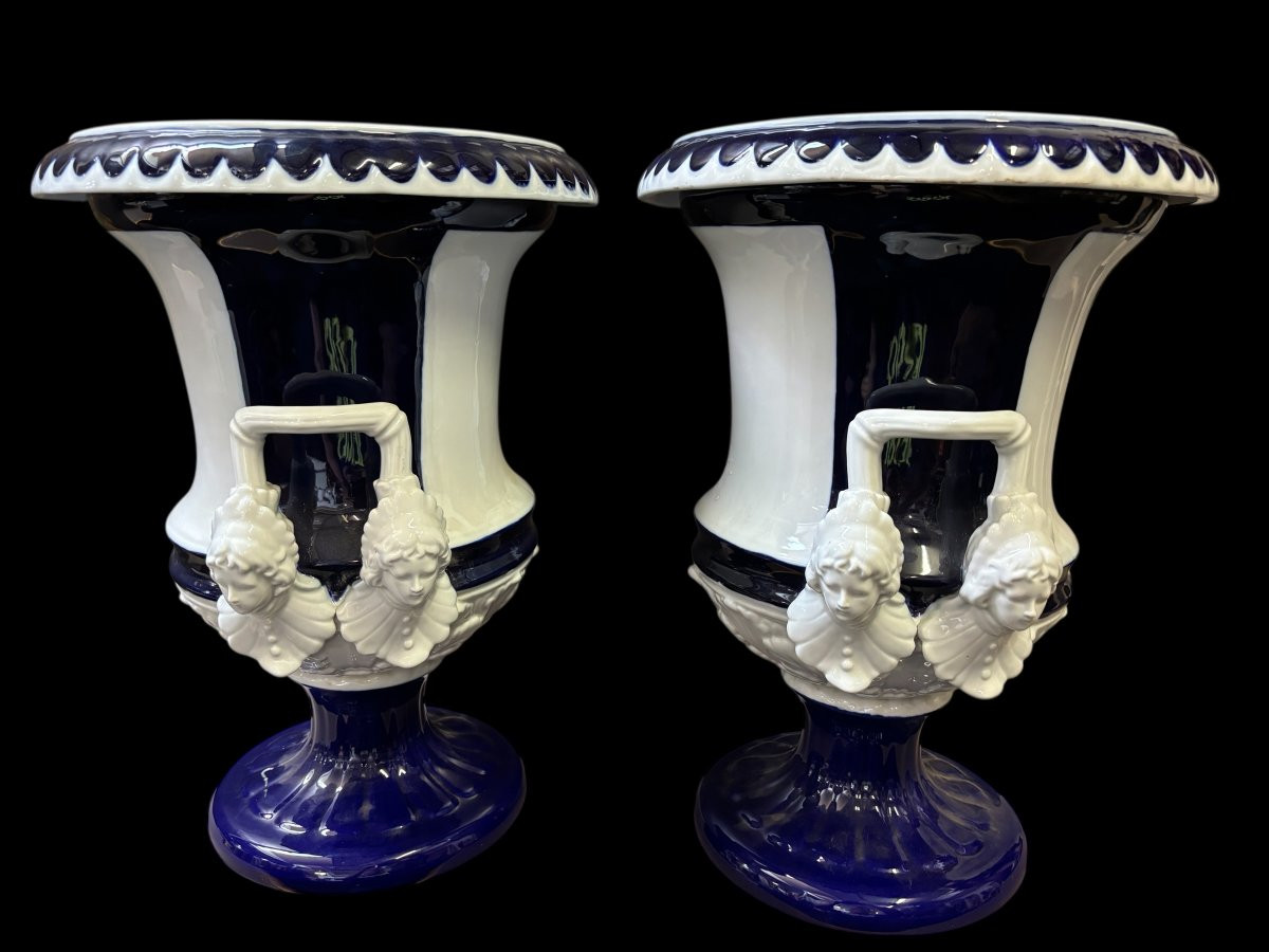 Pair of large Medici porcelain vases (45 cm) Decorative Medici vases in blue/white coloured porcelain from the middle of the 20th century with the following dimensions: Height: 45 cm Top diameter: 33 cm Diameter of foot: 22 cm Both in good condition.