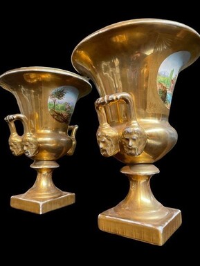 Pair of large Medici porcelain vases, Paris 19th century Very decorative gilded vases with landscape paintings. Both in good condition with some wear to the gold. Dimensions: Height: 37 cm Diameter : 28 cm Base: 13 x 13 cm Paris, 19th century