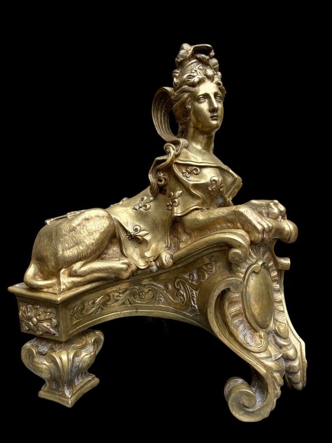 Pair of large Regency bronze ‘Sphinx’ andirons. Beautiful pair of gilt bronze andirons representing sphinxes supported by a coat of arms.Beautiful bronzes, high-quality workmanship, French,