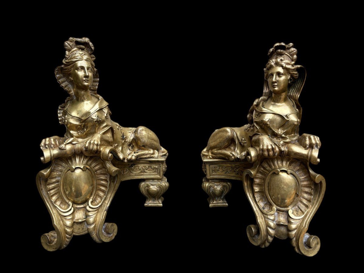 Pair of large Regency bronze ‘Sphinx’ andirons. Beautiful pair of gilt bronze andirons representing sphinxes supported by a coat of arms.Beautiful bronzes, high-quality workmanship, French,