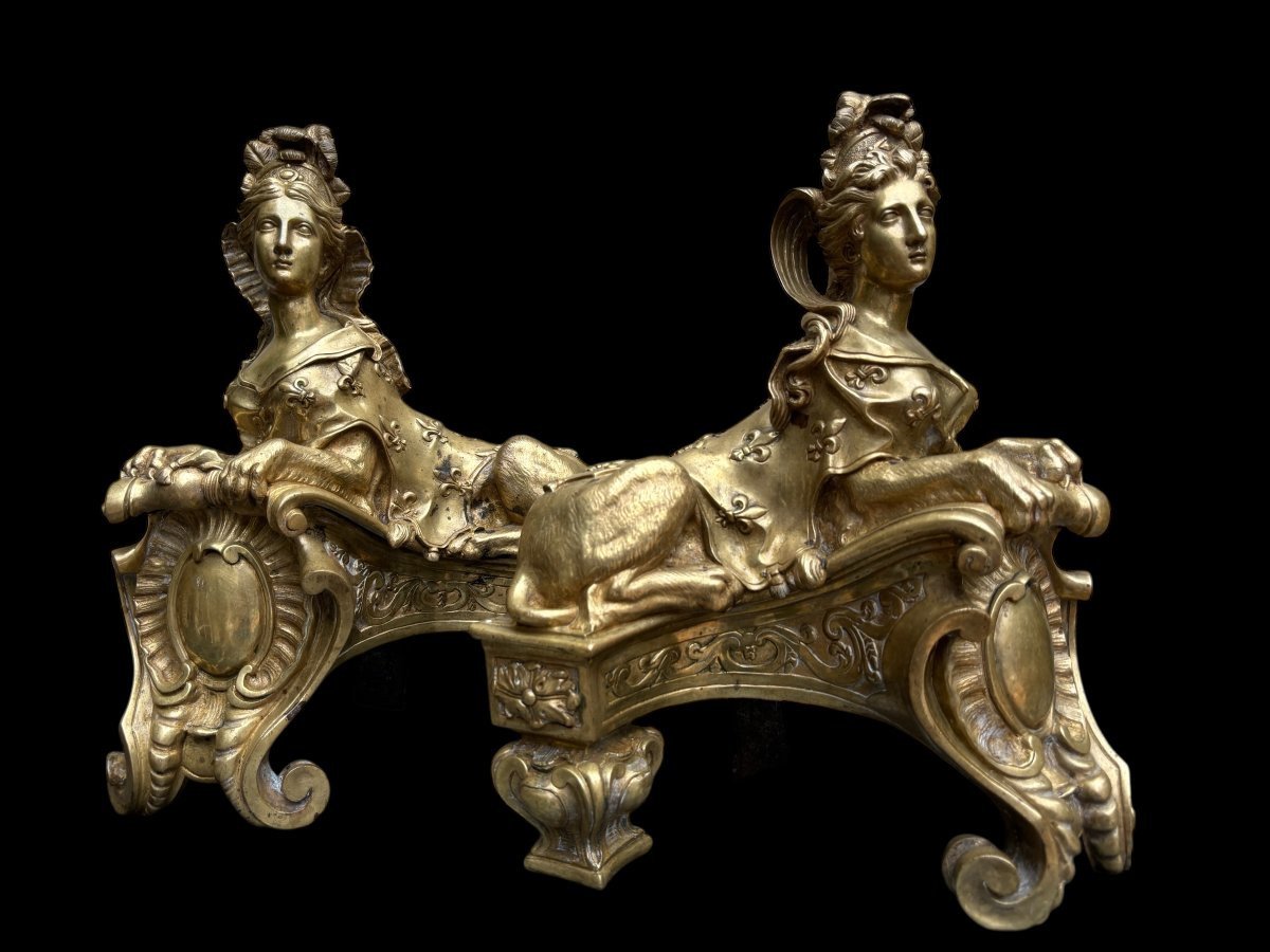 Pair of large Regency bronze ‘Sphinx’ andirons. Beautiful pair of gilt bronze andirons representing sphinxes supported by a coat of arms.Beautiful bronzes, high-quality workmanship, French,