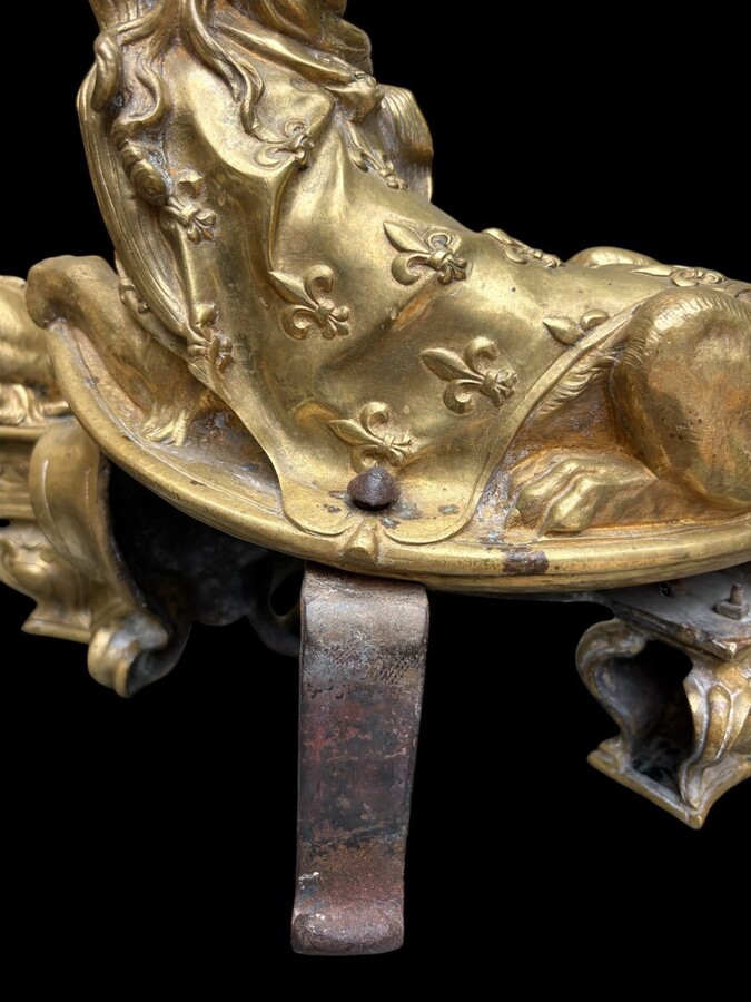 Pair of large Regency bronze ‘Sphinx’ andirons. Beautiful pair of gilt bronze andirons representing sphinxes supported by a coat of arms.Beautiful bronzes, high-quality workmanship, French,