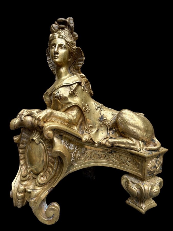 Pair of large Regency bronze ‘Sphinx’ andirons. Beautiful pair of gilt bronze andirons representing sphinxes supported by a coat of arms.Beautiful bronzes, high-quality workmanship, French