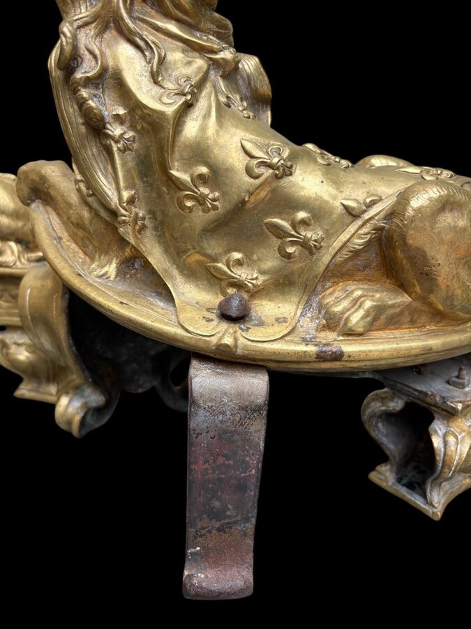 Pair of large Regency bronze ‘Sphinx’ andirons. Beautiful pair of gilt bronze andirons representing sphinxes supported by a coat of arms.Beautiful bronzes, high-quality workmanship, French