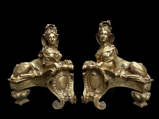 Pair of large Regency bronze ‘Sphinx’ andirons. Beautiful pair of gilt bronze andirons representing sphinxes supported by a coat of arms.Beautiful bronzes, high-quality workmanship, French