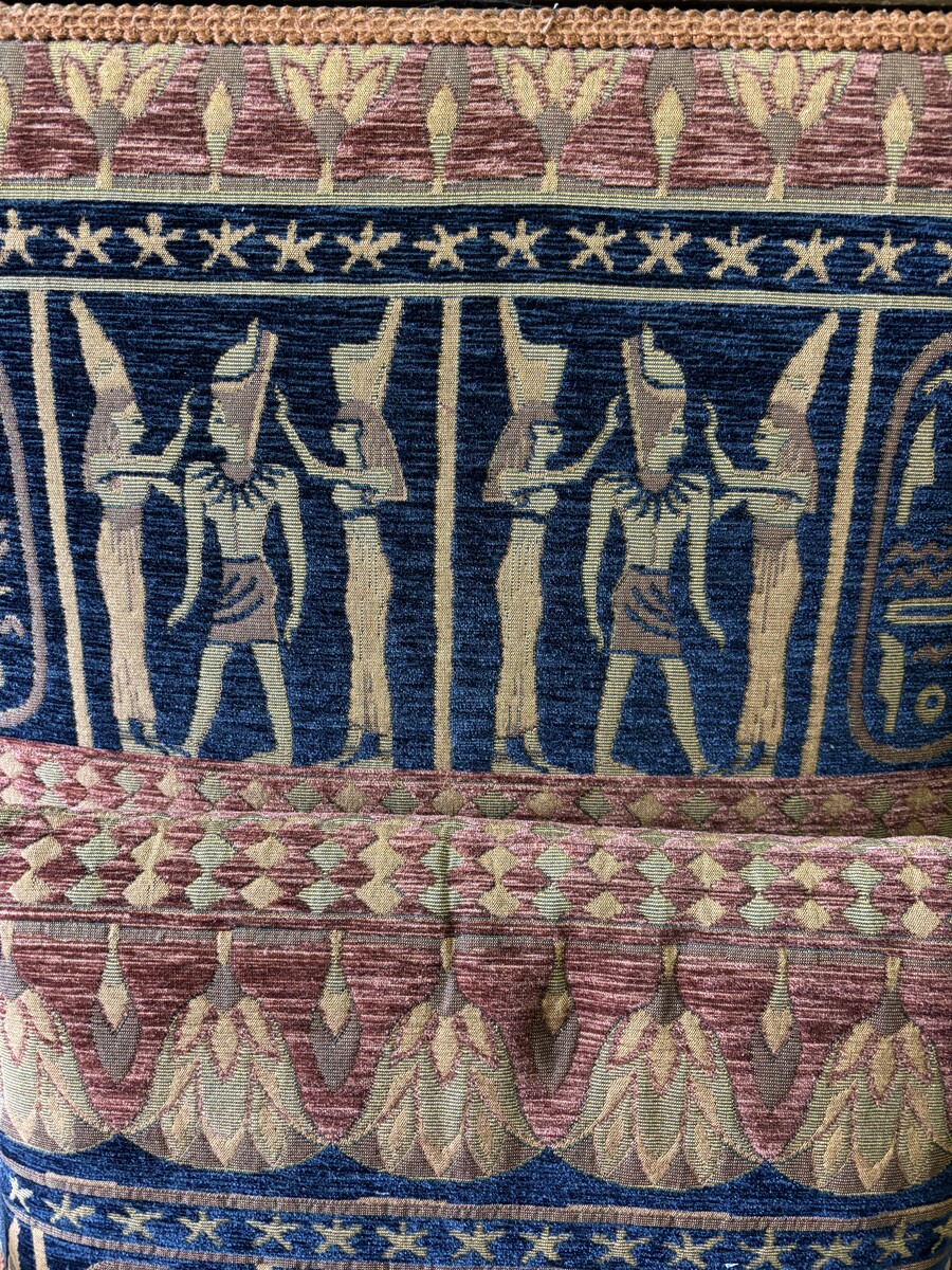Pair of large walnut armchairs in the 19th century Empire style Armchairs decorated with carved wooden sphinxes and Empire decorations and fitted with a beautiful fabric tapestry and a cushion with Egyptian representations. 