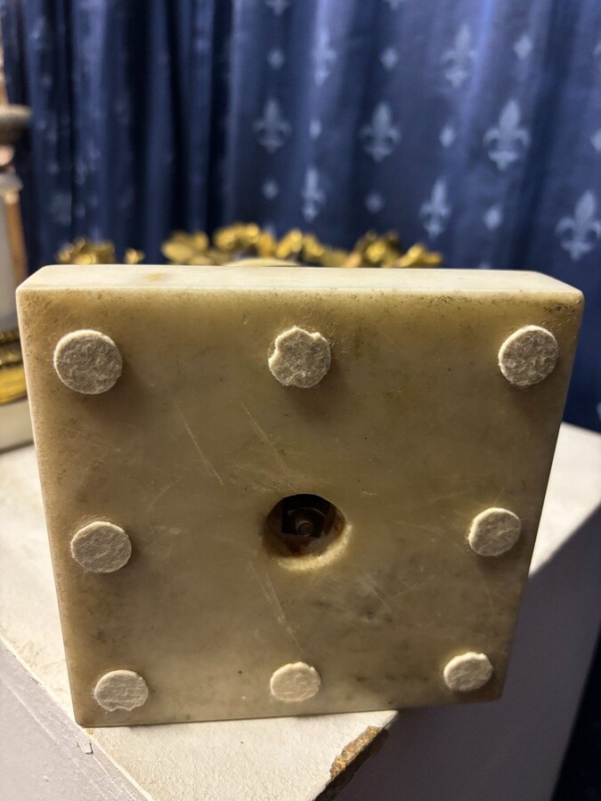 Pair of Napoleon III ‘2 angels’ bronze candelabras. Nice 19thC. candelabra representing a pair of angels carrying 3 gilt bronze candelabra with sprigs of flowers resting on a white marble base.