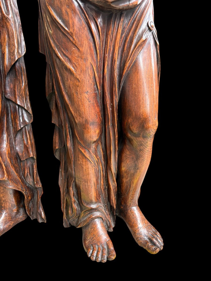 Pair of Renaissance-style sculptures/caryatids in oak, early 19thC. Beautifully carved decorative wooden sculptures representing a female figure and a male figure dressed in robes. Dimensions: Height: 123 cm Width: 31 cm Depth: 28/29 cm In good condition,