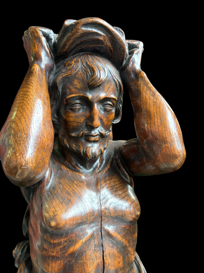 Pair of Renaissance-style sculptures/caryatids in oak, early 19thC. Beautifully carved decorative wooden sculptures representing a female figure and a male figure dressed in robes. Dimensions: Height: 123 cm Width: 31 cm Depth: 28/29 cm In good condition,