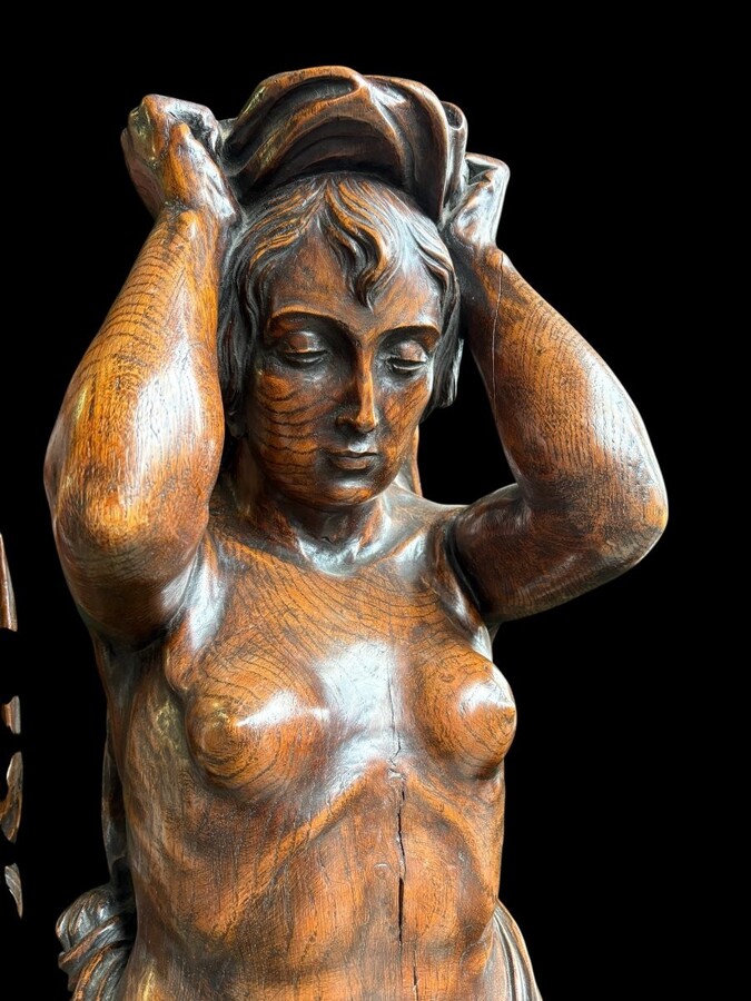Pair of Renaissance-style sculptures/caryatids in oak, early 19thC. Beautifully carved decorative wooden sculptures representing a female figure and a male figure dressed in robes. Dimensions: Height: 123 cm Width: 31 cm Depth: 28/29 cm In good condition