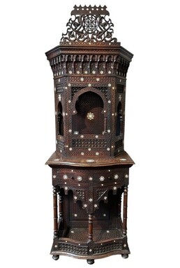 Sculpted furniture with inlays of ebony and mother-of-pearl. Syria , early 19th century. Furniture in used condition , consists of 2 parts with some missing pieces of wood Dimensions : Height : 234 cm Width : 86 cm Depth : 30 / 48 cm
