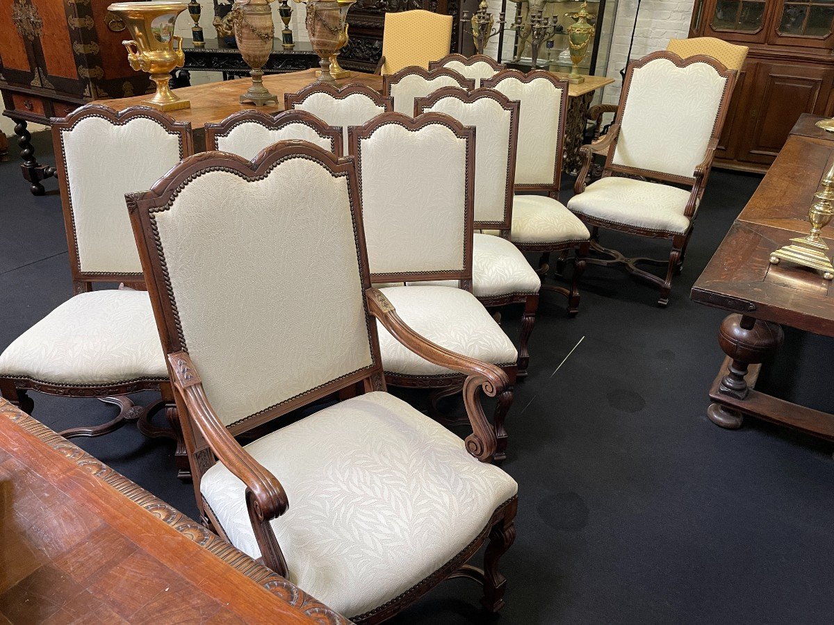 Set of 10 chairs style Régence in walnut 1900 Beautiful set of 8 chairs + 2 armchairs in walnut with fabric upholstery. Height : 107 ( 8x ) / 114 ( 2x ) Width : 52 / 62 cm Depth : 50 / 55 cm The set in good condition and from around 1900-1920
