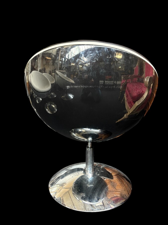 Set of 12 designer chairs in a half-egg shape with coloured polyester frame, chrome metal swivel base and white and black sky upholstery. Late 20th century reproductions based on a model from the 1960s-1970s. In good condition with signs of wear.