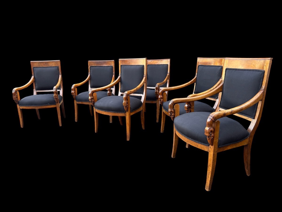 Set of 6 Charles X armchairs, 19th century Beautiful set of fruitwood armchairs decorated with swan-neck armrests. The armchairs have recently been reupholstered in black fabric and are therefore in very good condition.